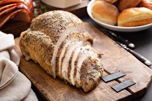 Sliced turkey on Thanksgiving or Christmas table photo