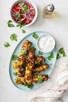 Chicken kebab with tzatziki sauce photo