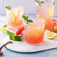 Watermelon lemonade or cocktail, refreshing summer drink photo