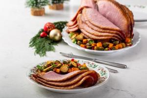 Christmas spiral ham with vegetables on the side photo