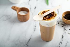 Creme bruleed iced coffee or tea with milk foam topping