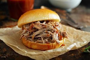 Pulled pork sandwich on a brioche bun photo