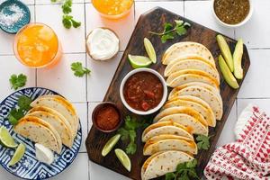 Baked tacos with pulled chicken and cheese photo