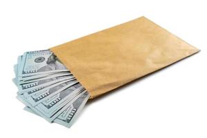 Pile of new design US dollar bills in brown envelope isolated on white background photo