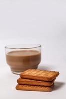 Wheat biscuits in the white plate, Atta biscuit, cookies - close up of a fresh breakfast cookies. photo