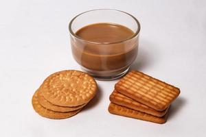 Wheat biscuits in the white plate, Atta biscuit, cookies - close up of a fresh breakfast cookies. photo