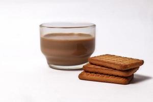 Wheat biscuits in the white plate, Atta biscuit, cookies - close up of a fresh breakfast cookies. photo