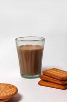 Wheat biscuits in the white plate, Atta biscuit, cookies - close up of a fresh breakfast cookies. photo