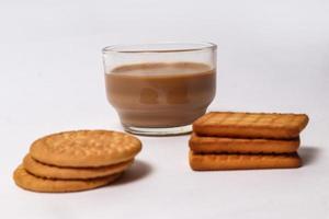 Wheat biscuits in the white plate, Atta biscuit, cookies - close up of a fresh breakfast cookies. photo