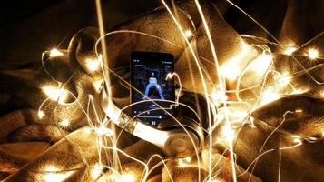 Headphones Surrounded By Fairy Lights In Long Exposure in Karachi Pakistan 2022 photo