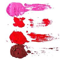 Different multi colored samples of a smudged lipstick photo