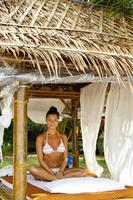 Young caucasian woman after traditional Thai massage photo