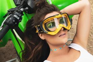 Stylish and beautiful woman and the ATV photo