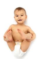 Cute little baby in diaper on white background photo