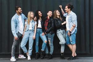 Group of friends during a meeting on a city street photo