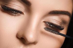 Mascara wand for maximum volume of artificial eyelashes photo