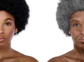 Comparison of young and elderly. African woman on white background. photo