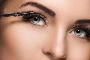 Mascara wand for maximum volume of artificial eyelashes photo