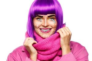 Model in creative image with pop art makeup photo