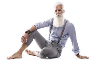 Handsome aged male model posing on white background photo