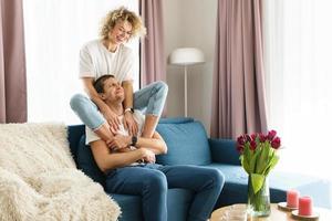 Young and sensual couple spendig time together at home photo