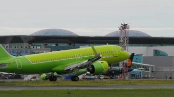 NOVOSIBIRSK, RUSSIAN FEDERATION JULY 15, 2022 - Airbus A320, RA 73453 of S7 Airlines landing at Tolmachevo airport, side view. Footage of a passenger plane arriving. Tourism and travel concept video