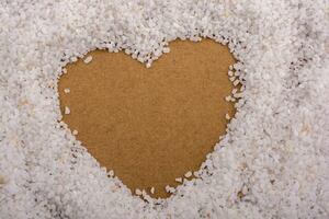 White sand stone form heart shape photo