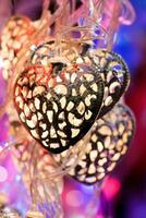 Heart shaped lamps glowing used for decoration photo