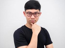 Asian man wearing glasses confident face looking at camera portrait on white background photo