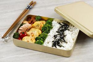 Dosirak, Korean Lunchbox Contains of Rice with Various Side Dish. photo