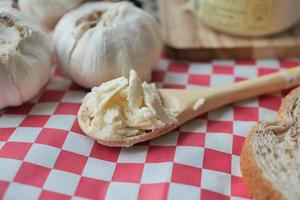 top view of garlic spread on a spoon photo