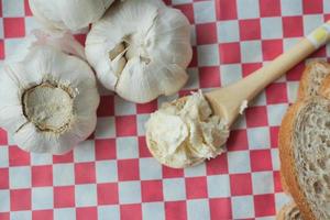 top view of garlic spread on a spoon photo