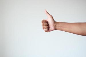man hand showing a thumb-up photo