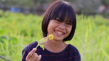 Close-up of the face of an elementary school girl, child girl, slow motion video