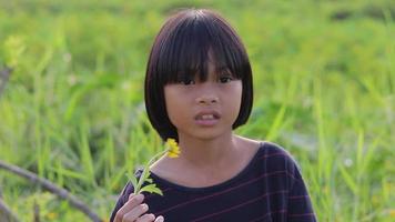 Close-up of the face of an elementary school girl, child girl, slow motion video