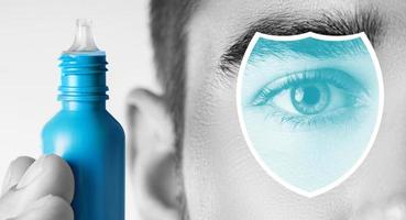 Protect your vision - eye and small bottle of eyedrops photo