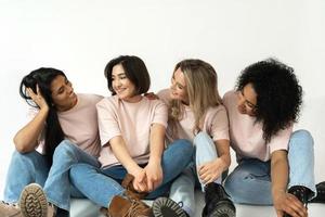 Multicultural diversity and friendship. Group of different ethnicity women. photo