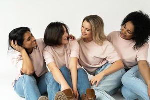 Multicultural diversity and friendship. Group of different ethnicity women. photo