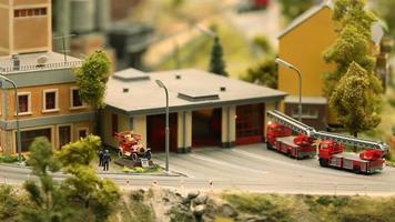 fire station in the city, road fire truck ladder, firefighters, animation video