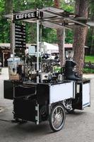 Movable coffee shop on the city street photo