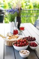 Juicy and sweet berries on the table photo