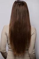 Young woman showing her healthy natural hair photo