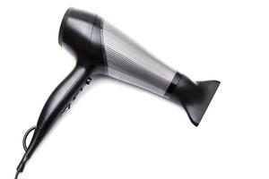 Professional hair dryer device on white background photo