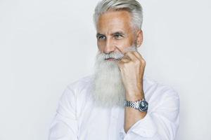 Handsome aged senior man on white background photo