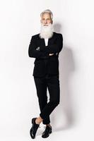 Handsome aged man wearing stylish black suit photo