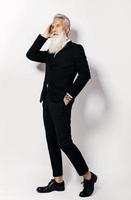 Handsome aged man wearing stylish black suit photo