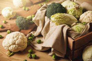 A lot of different cabbages in the wooden box photo