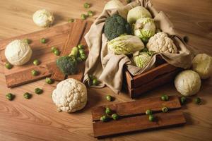 A lot of different cabbages in the wooden box photo