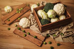 A lot of different cabbages in the wooden box photo