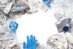 Background with a piile of different plastic waste photo